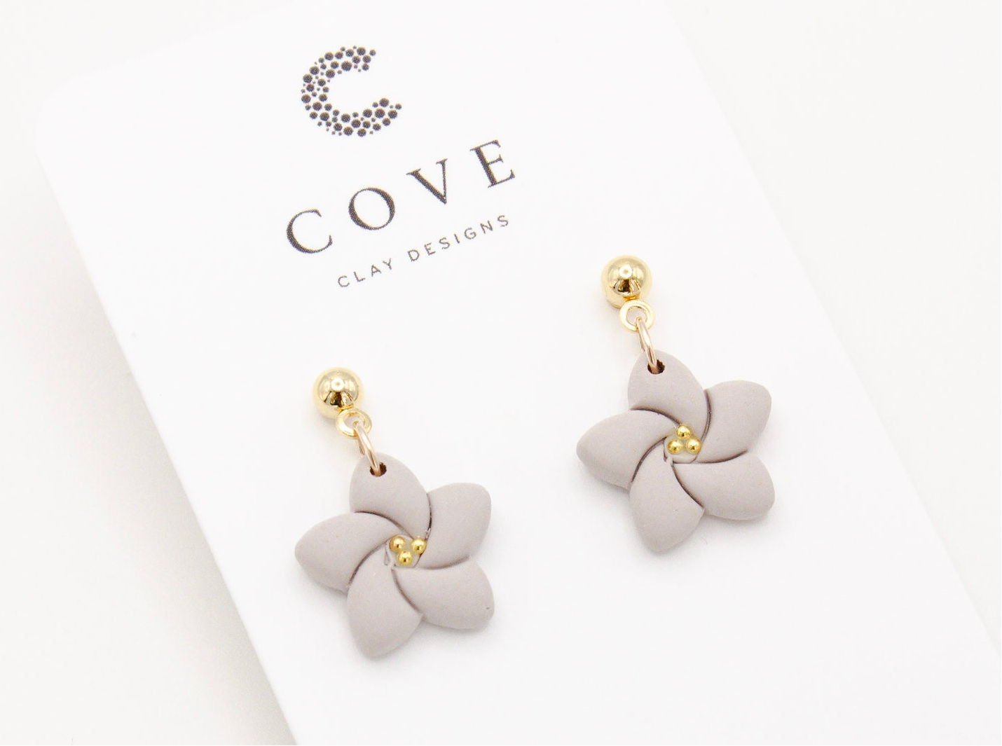 Handmade Purple Tropical Flower Polymer Clay Earrings by Cove Clay Designs