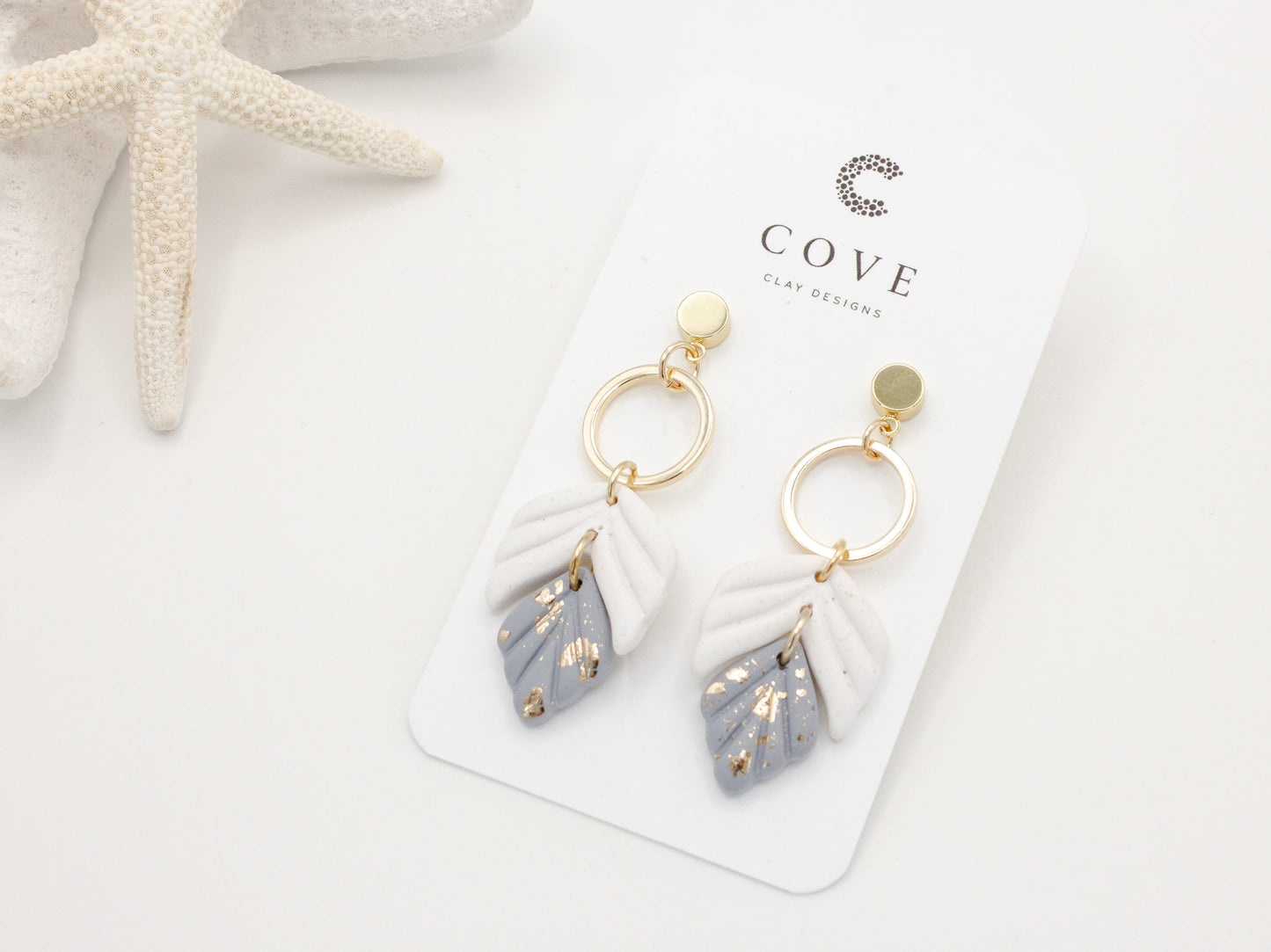 Handmade Dusty Blue White Leaf Polymer Clay Dangle Earrings by Cove Clay Designs