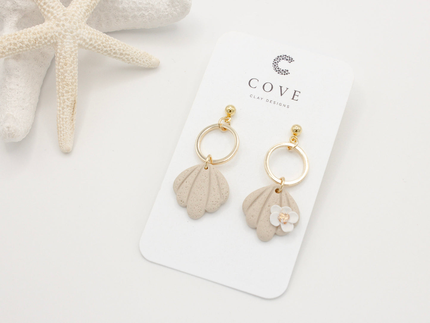 Handmade Beach Shell Polymer Clay Earrings with White Flower by Cove Clay Designs