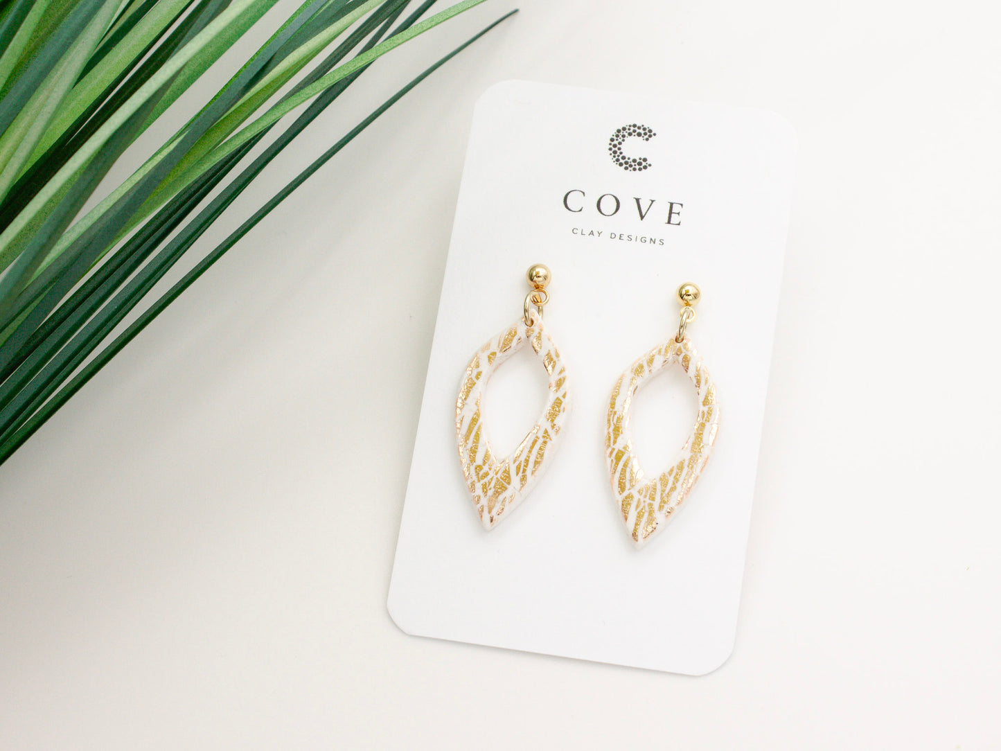 Handmade Gold Tropical Leaf Print Polymer Clay Earrings by Cove Clay Designs