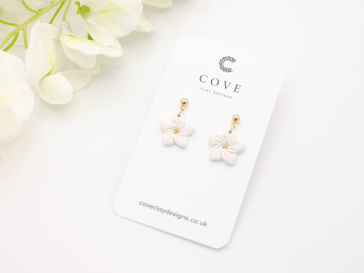 Handmade White Tropical Flower Polymer Clay Earrings by Cove Clay Designs