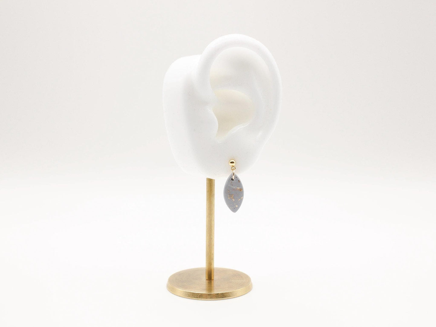 Handmade mini dusty blue and speckled gold little drop polymer clay earrings by Cove Clay Designs