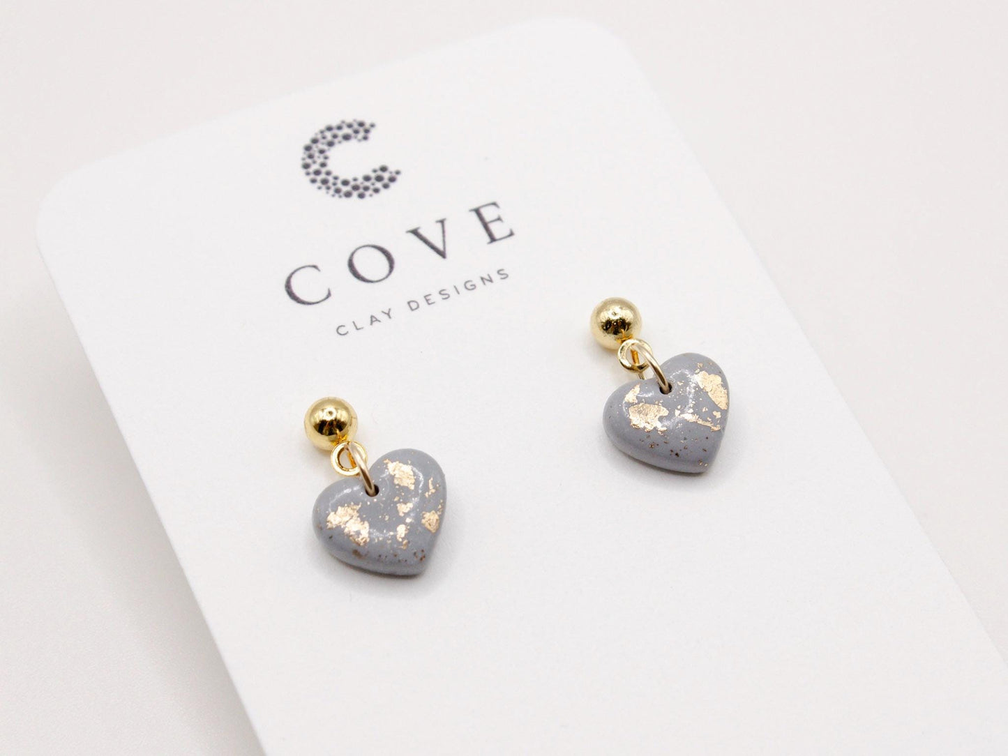Handmade dusty blue and speckled gold mini heart polymer clay earrings