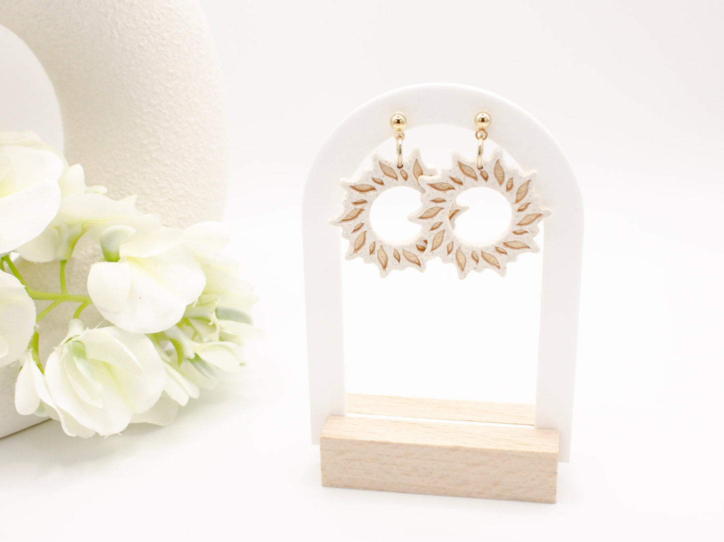 Handmade gold sun dangle clay earrings with gold posts by Cove Clay Designs