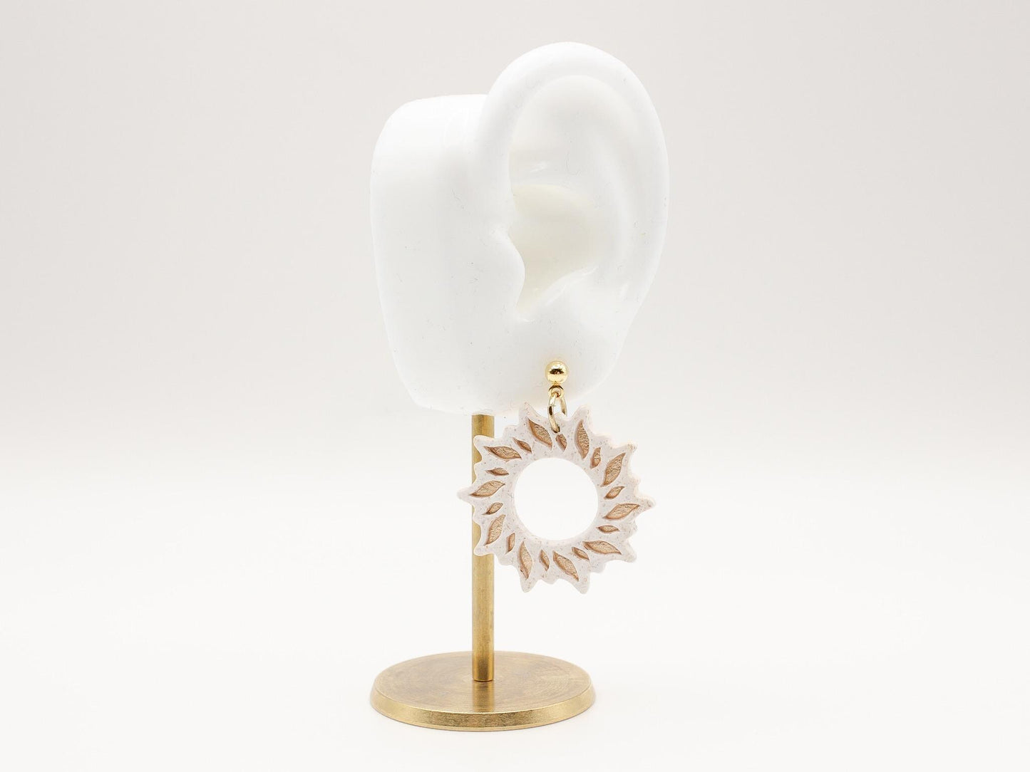 Handmade gold sun dangle clay earrings with gold posts by Cove Clay Designs