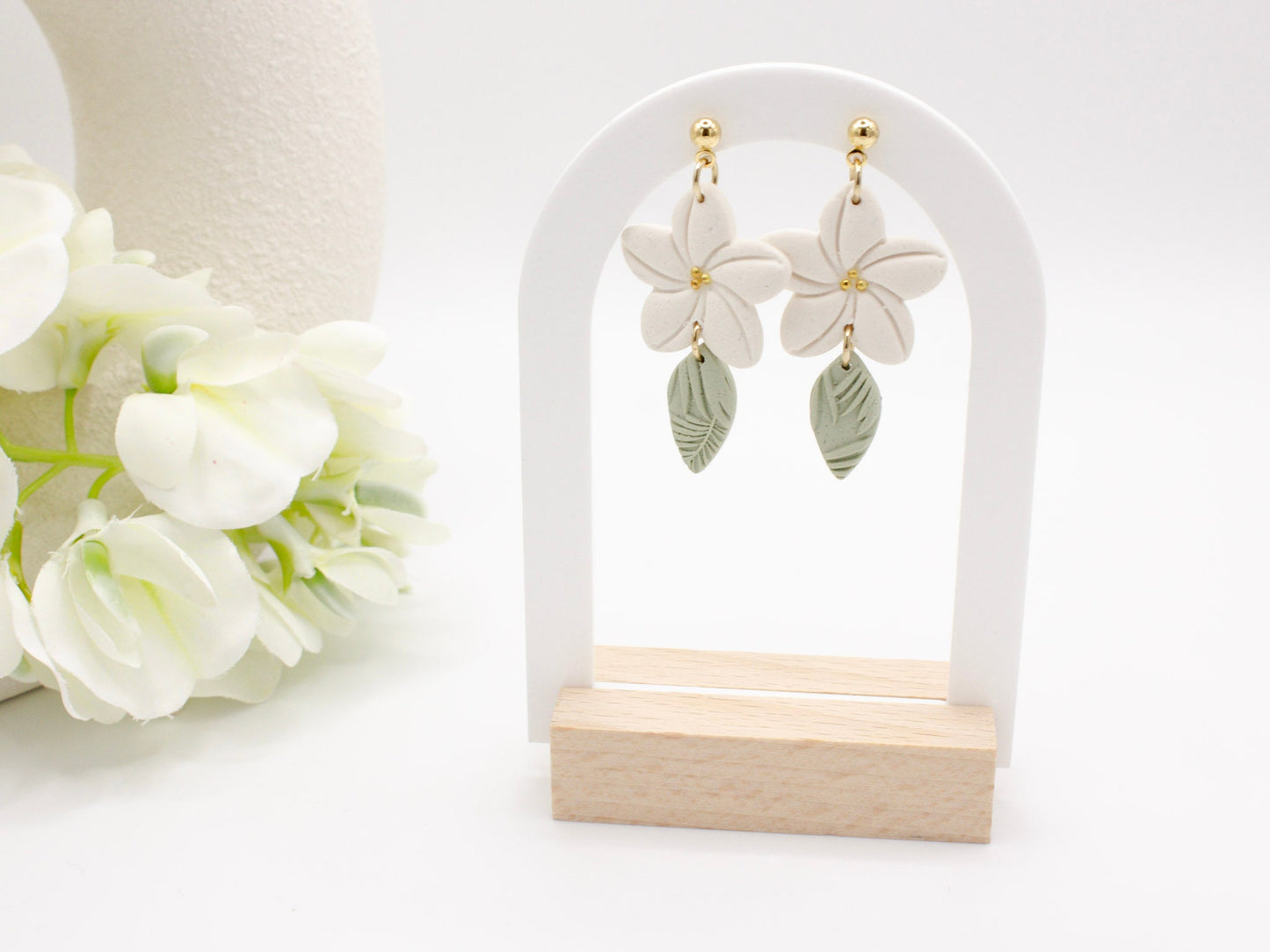 Handmade white plumeria tropical Hawaiian flower clay earrings by Cove Clay Designs