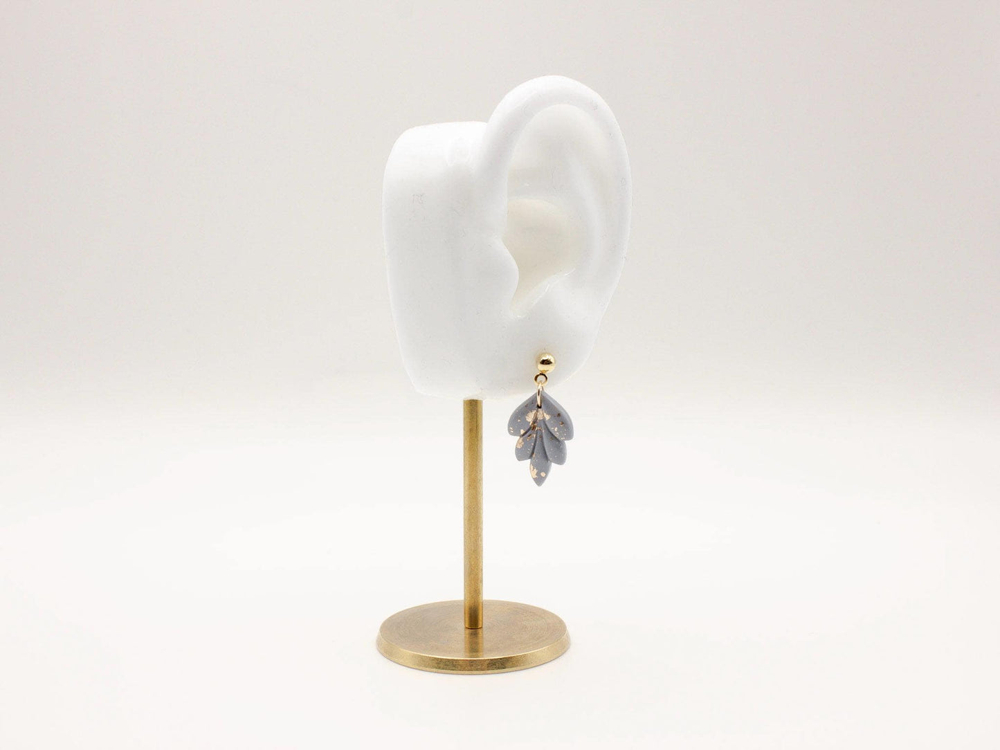 Handmade mini dusty blue and speckled gold leaf polymer clay earrings by Cove Clay Designs