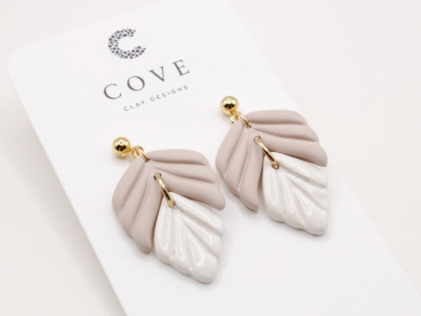 Handmade mauve and white leaf polymer clay earrings by Cove Clay Designs