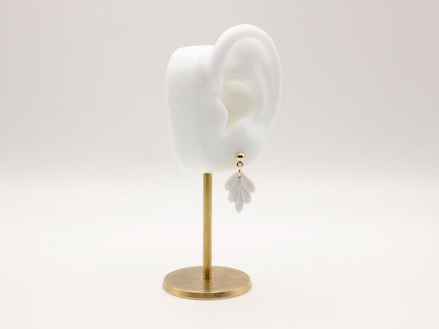 Handmade mini white leaf polymer clay earrings by Cove Clay Designs