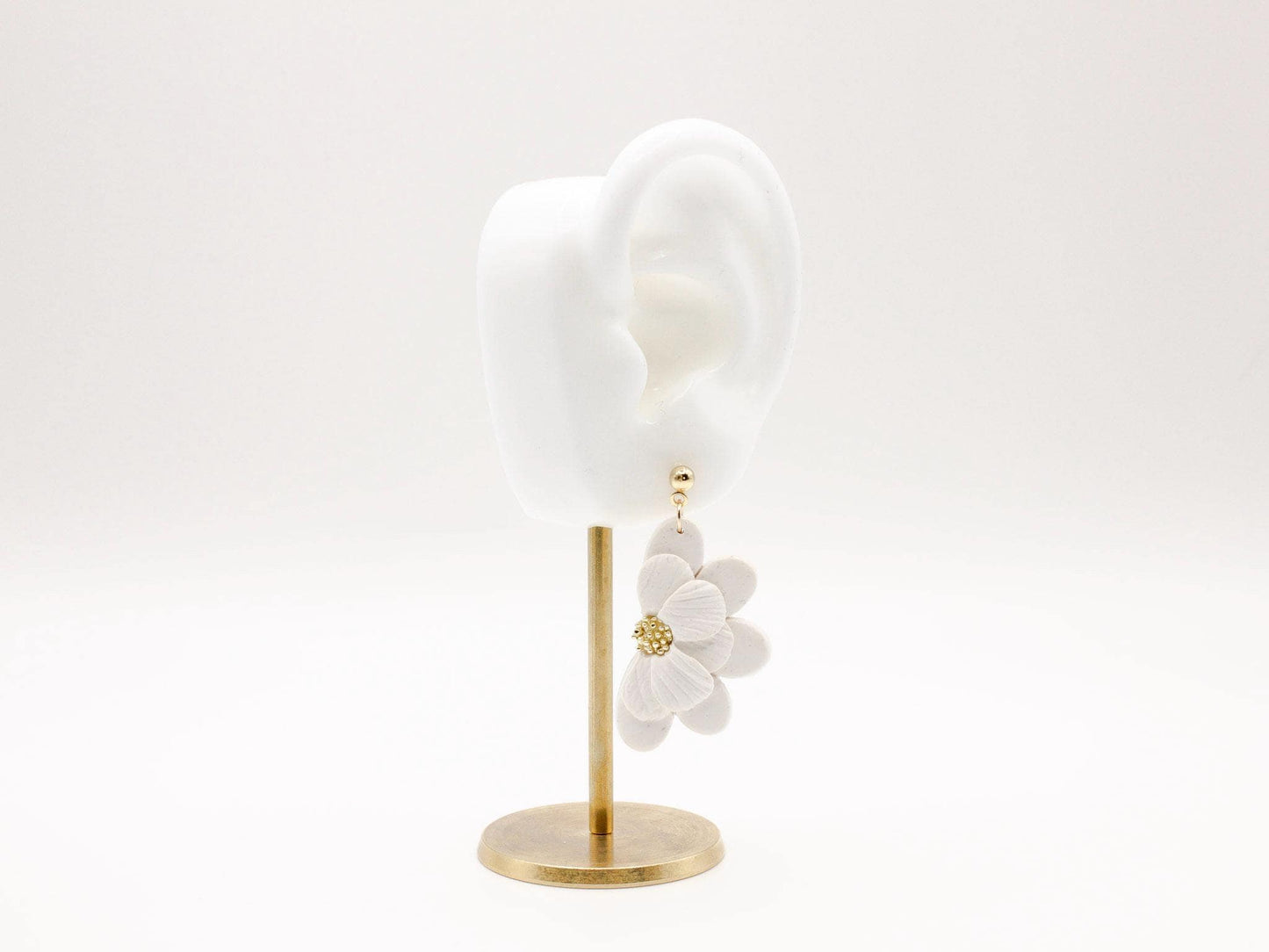 Handmade white flower polymer clay earrings by Cove Clay Designs