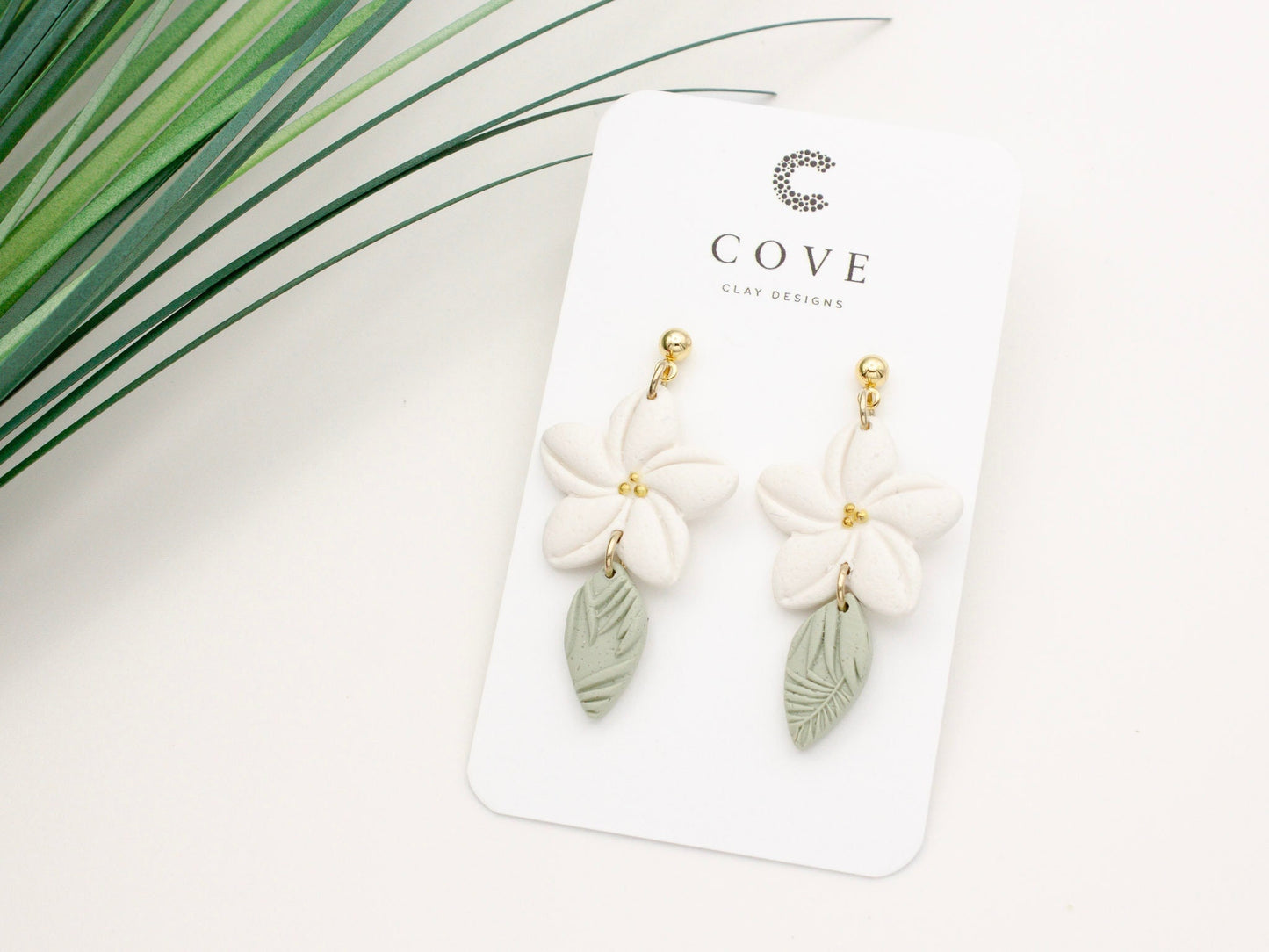 Handmade white plumeria tropical Hawaiian flower clay earrings by Cove Clay Designs