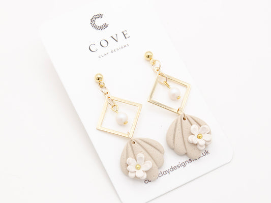 Handmade Beach Shell Polymer Clay Earrings with White Flower by Cove Clay Designs