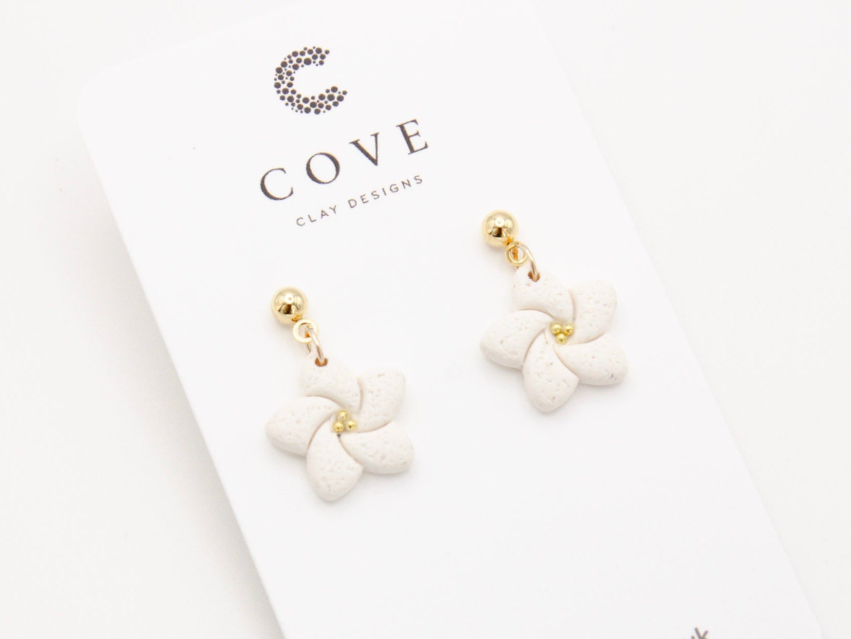 Handmade White Tropical Flower Polymer Clay Earrings by Cove Clay Designs