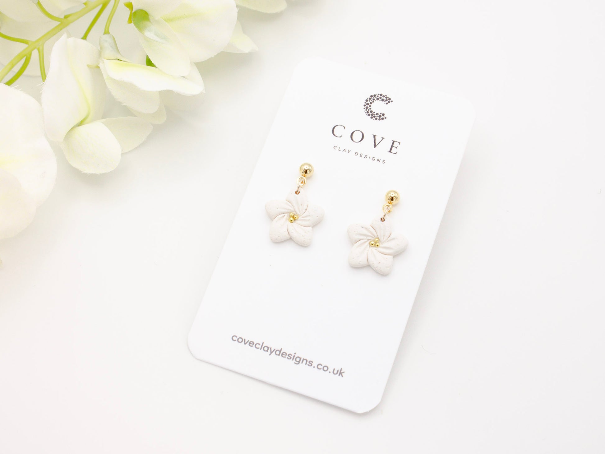Handmade White Tropical Flower Polymer Clay Earrings by Cove Clay Designs