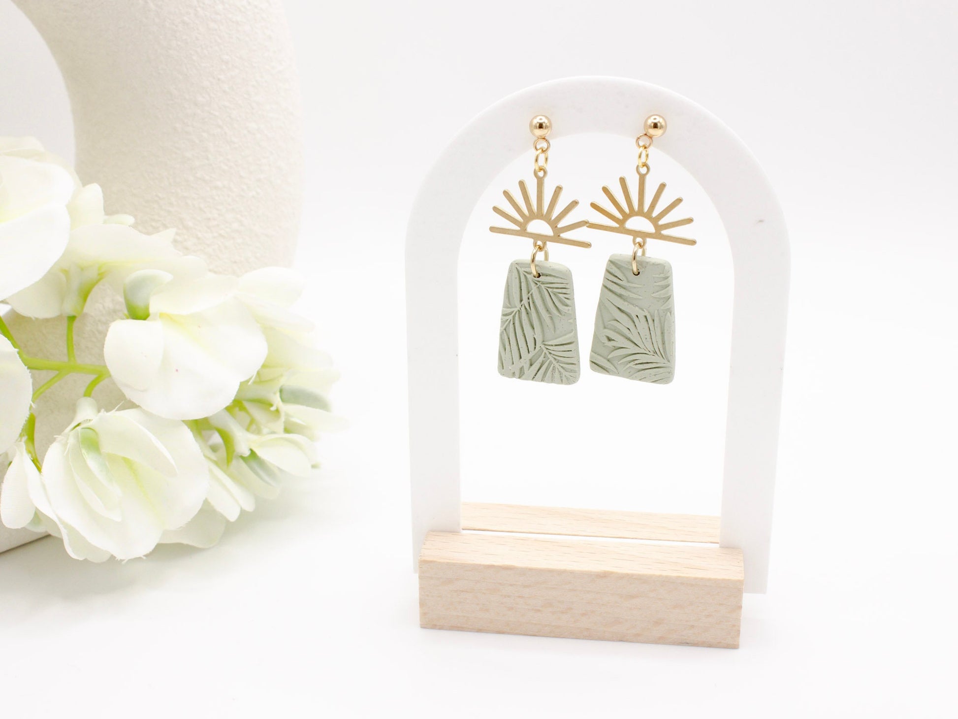 Handmade gold half sun and green tropical texture dangle polymer clay earrings by Cove Clay Designs