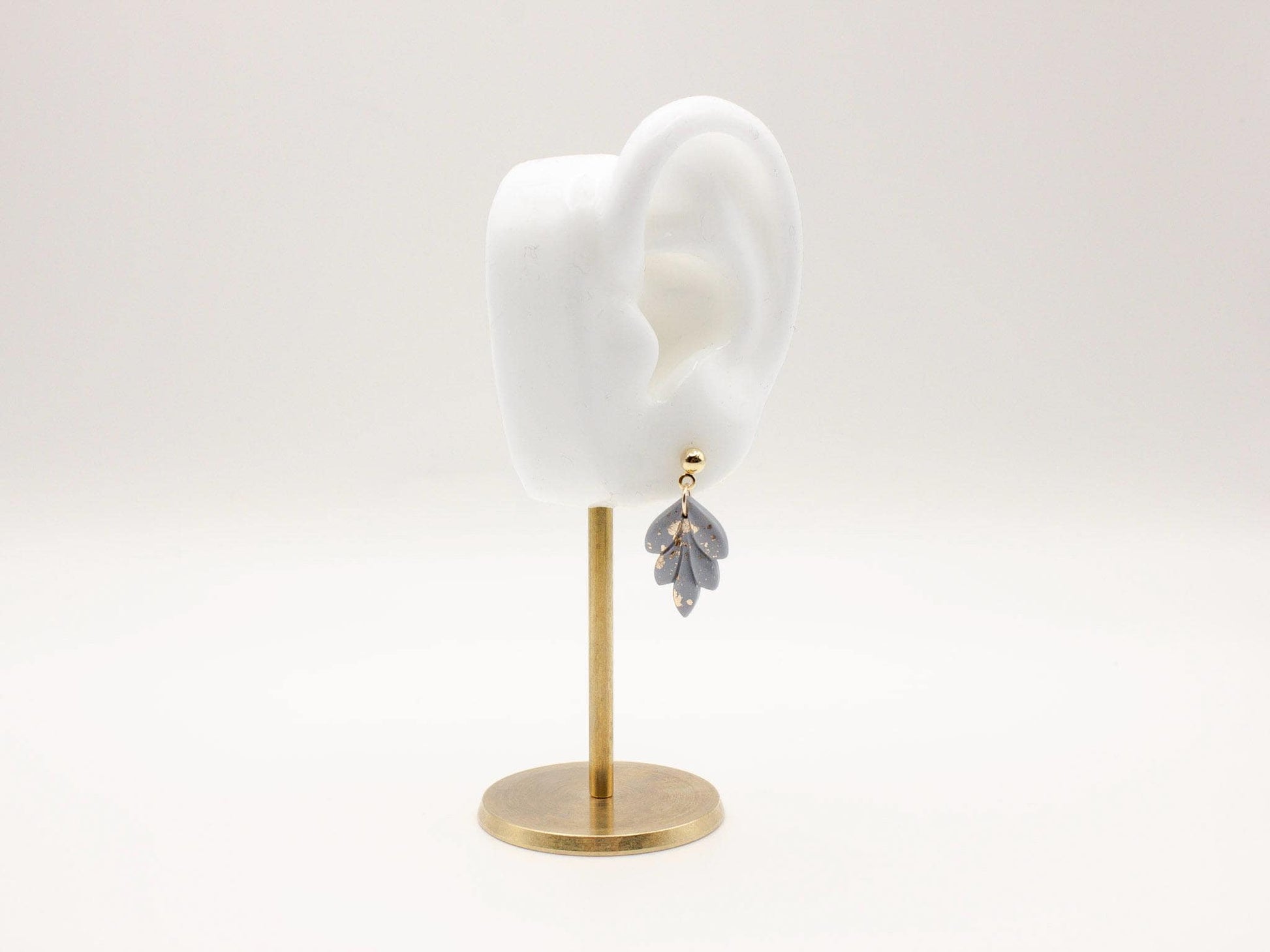 Handmade mini dusty blue and speckled gold leaf polymer clay earrings by Cove Clay Designs