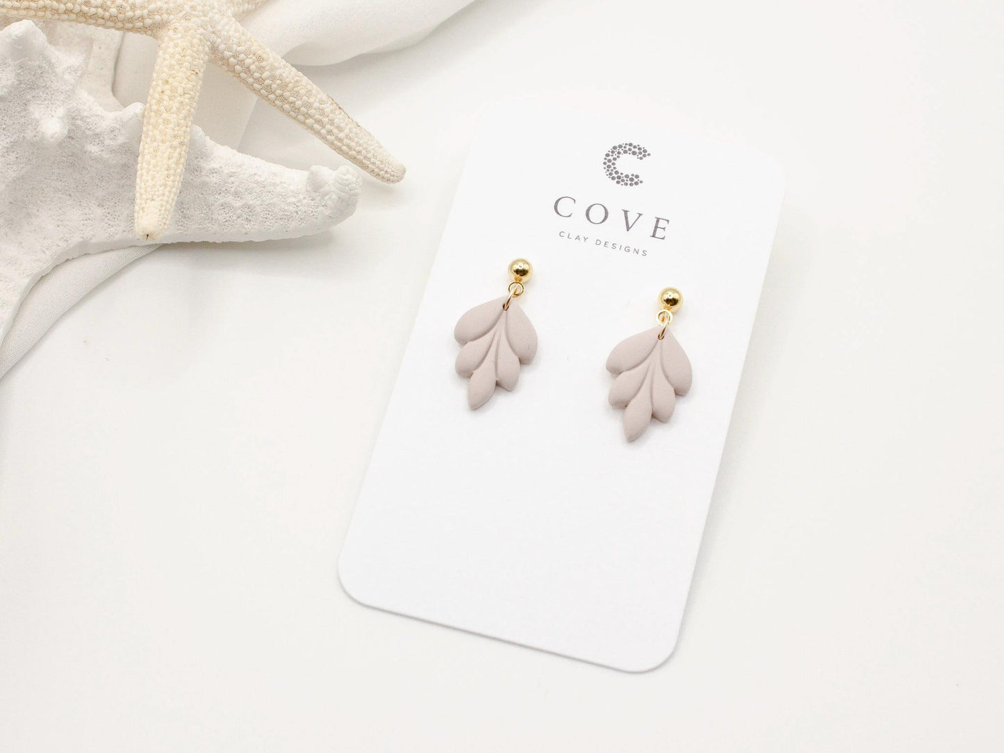 Handmade mini mauve leaf polymer clay earrings by Cove Clay Designs
