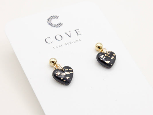 Handmade black and gold fleck mini heart polymer clay earrings by Cove Clay Designs