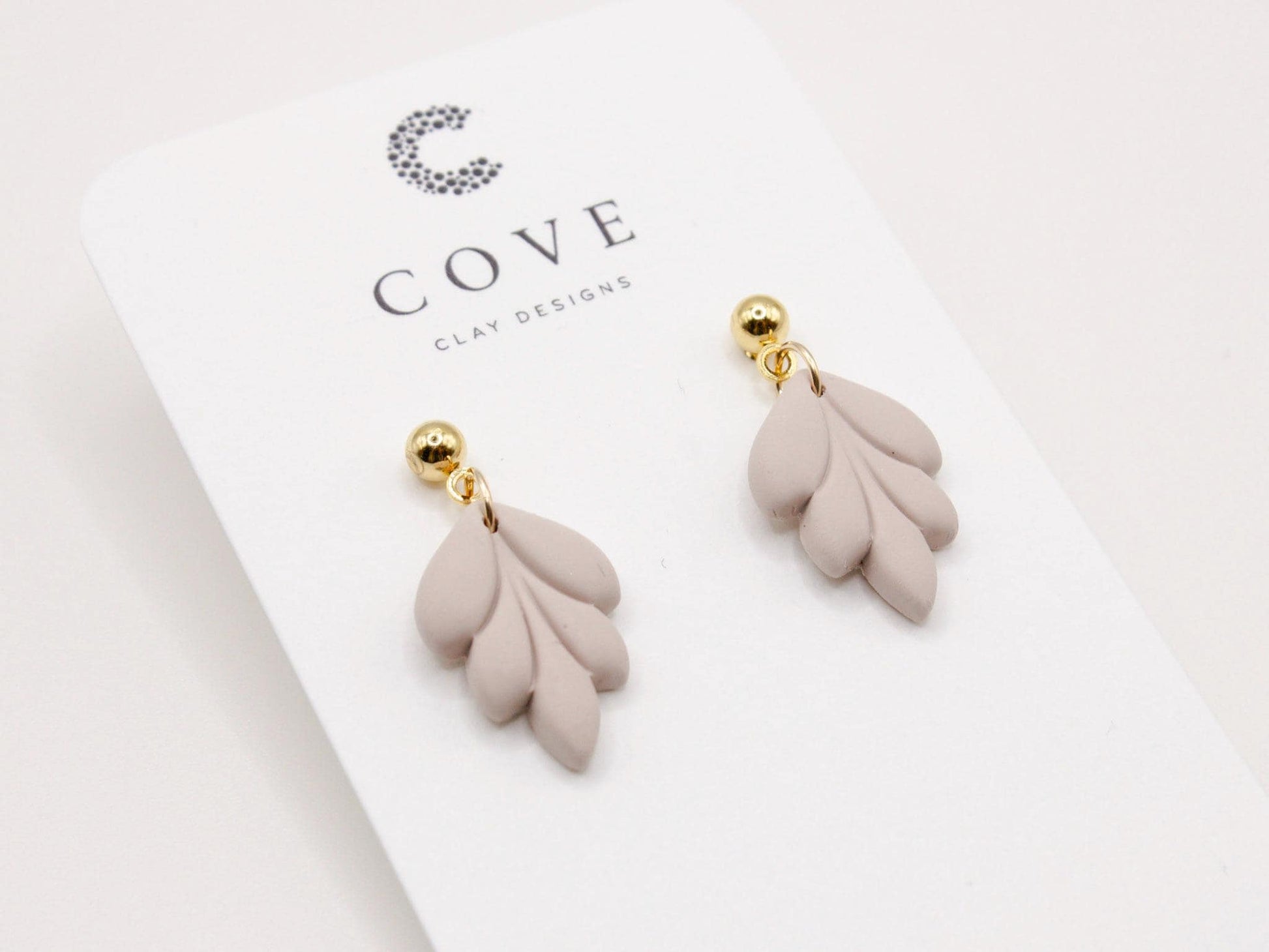 Handmade mini mauve leaf polymer clay earrings by Cove Clay Designs