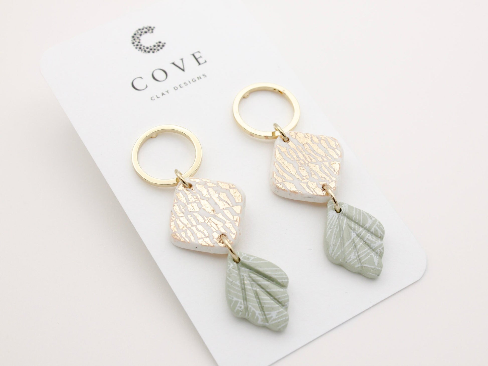 Handmade gold and green tropical vibe dangle earrings with gold hoop by Cove Clay Designs